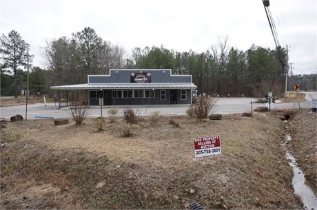 3.10 +/- Acres with a 2,500 sq. ft. Building Located in McCalla, AL